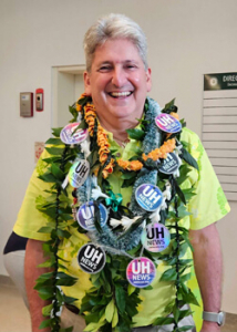 Lassner wearing lei