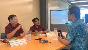 people talking at a table