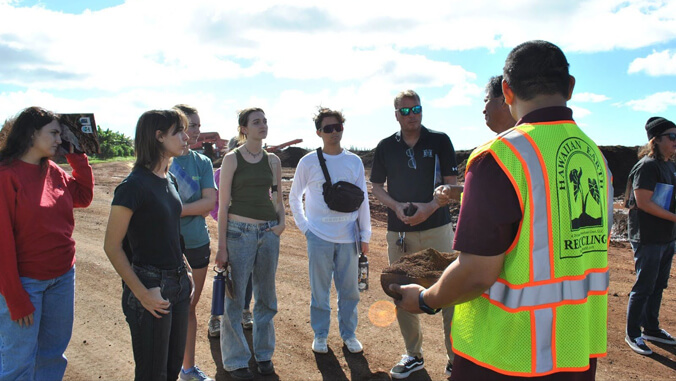 students at a composting tour