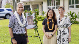 bruno, jun and hensel pose with alice ball's photo