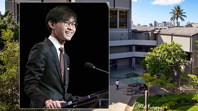 person speaking at a podium