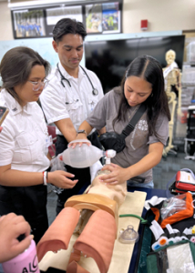 student working with E N T instructor