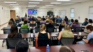 People seated in a classroom