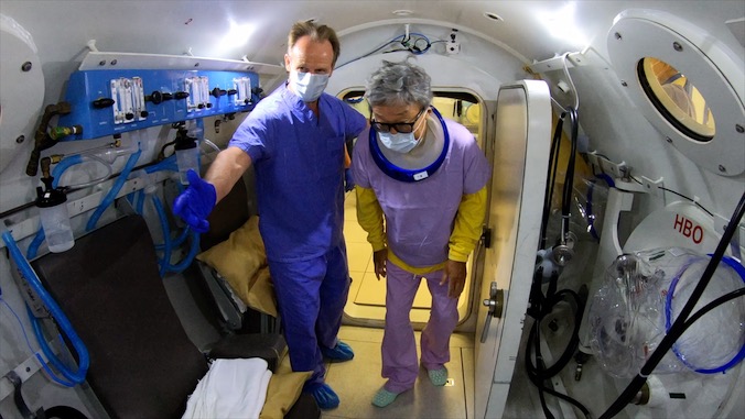 patient enters treatment chamber